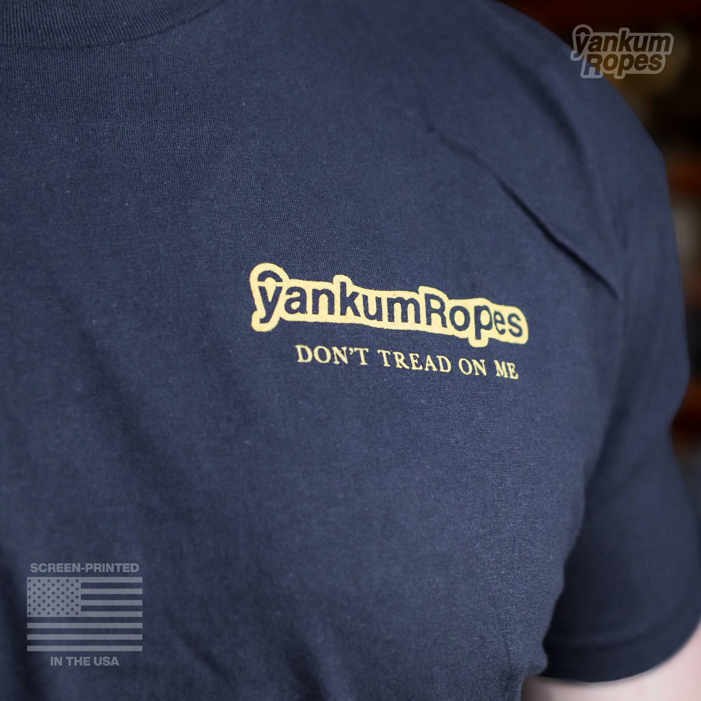 front view of the new Yankum Don't tread on me tee in black