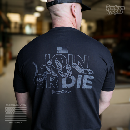 view of the back of the black Yankum Join or Die Tee