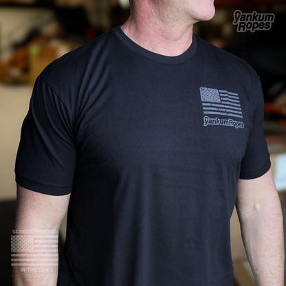 view of the back of the black Yankum Join or Die Tee